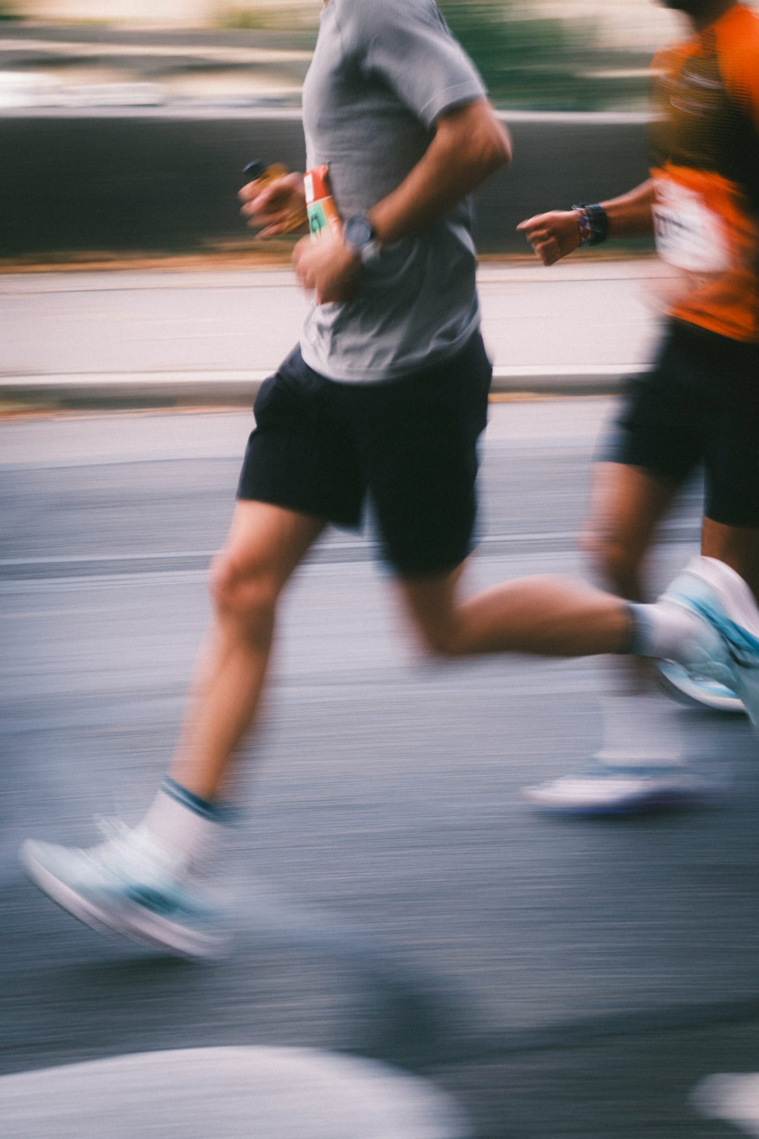 Runners at high speed on a track